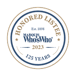 Circular badge displaying "Honored Listee, Marquis Who's Who 2023, Est. 1898, 125 Years" in blue and gold text on a white background. Circular badge displaying "Honored Listee, Marquis Who's Who 2023, Est. 1898, 125 Years" in blue and gold text on a white background.